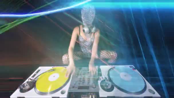 Masked Female Playing Turntables Sparkling Silver Costume Overlayed Disco Lighting — Stockvideo