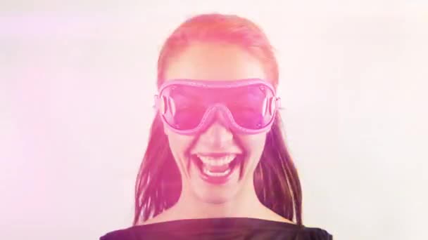 Pretty Woman Wearing Retro Goggles Making Faces — Stockvideo