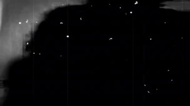 Beautiful female dj playing with turntables in black and white with film scratches