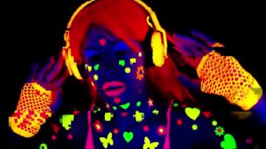 A cool sexy dancing woman wearing UV fluorescent clothing and makeup with overlayed glitching