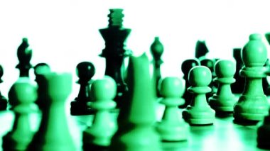 Close up of chess board against spinning with changing colours
