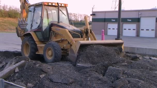 Backhoe Loader Pushing Pavement — Stock Video