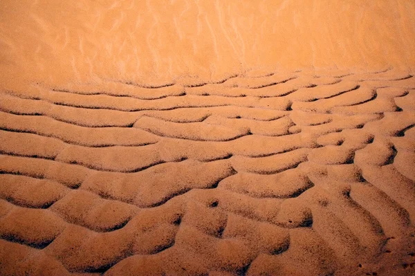 Текстура песка — стоковое фото