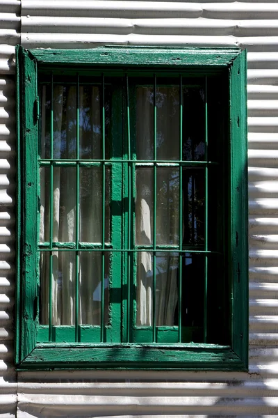 Venetian blind and a metal wall — Stock Photo, Image