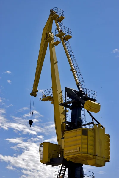 Sky clouds and yellow crane argentina — Stock Photo, Image