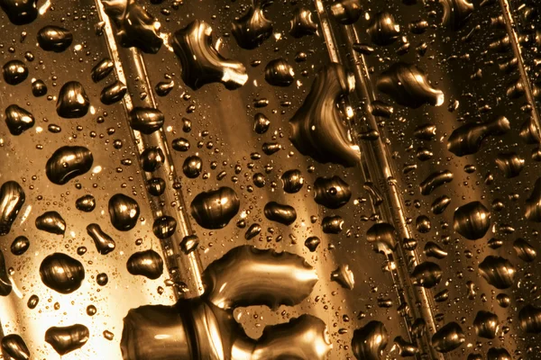 Abstract gold drop — Stock Photo, Image