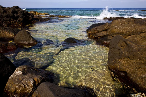 Pěna pobřeží lanzarote Španělsko pižmo a v létě — Stock fotografie
