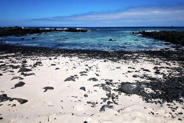 Black rock spain landscape cloud beach in lanzarote isle — Stock Photo, Image