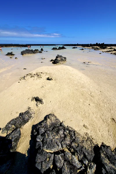 People spain black rocks lanzarote — Stock Photo, Image