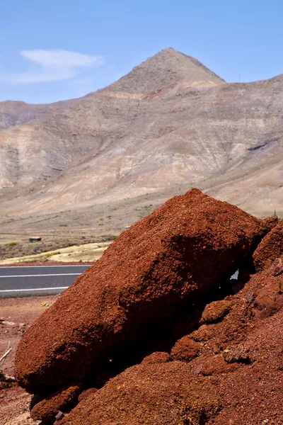 Vulkanischen timanfaya roten Felsen Stein Himmel — Stockfoto