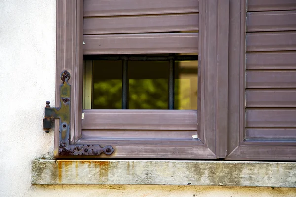 Italy abstract  window mornago  the concrete brown plastic — Stock Photo, Image