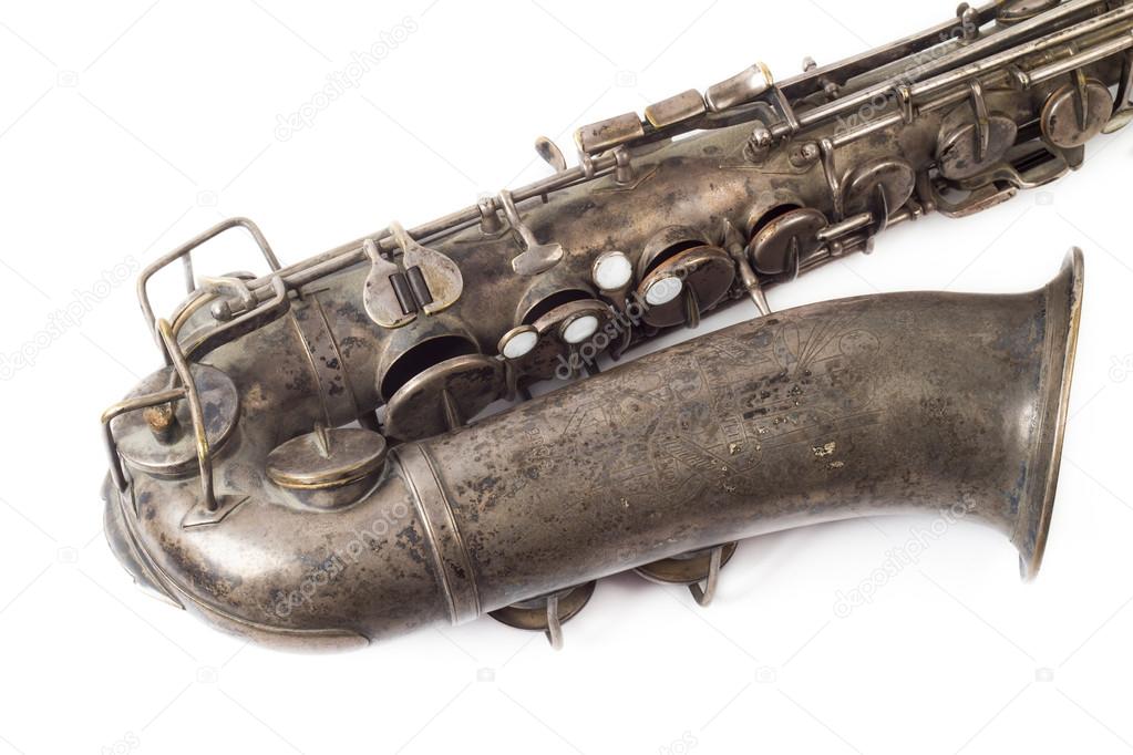 Saxophone on the white background