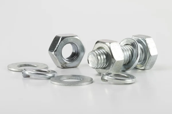 Fasteners on the white background — Stock Photo, Image