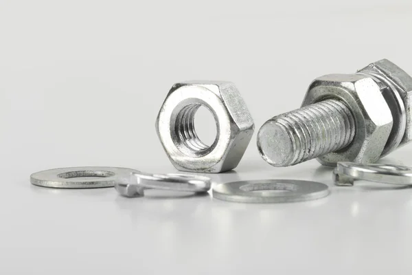 Fasteners on the white background — Stock Photo, Image