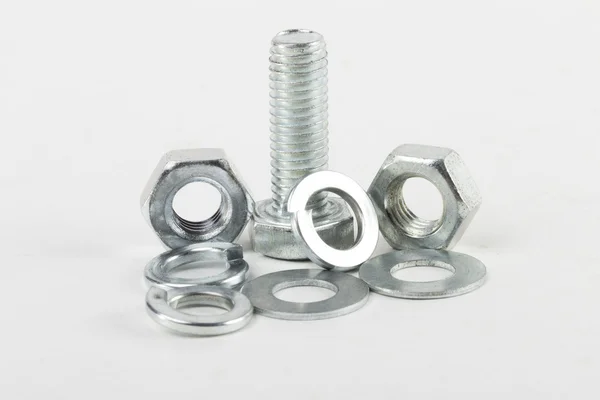 Fasteners on the white background — Stock Photo, Image