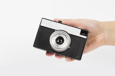 Beyaz arkaplandaki kamera