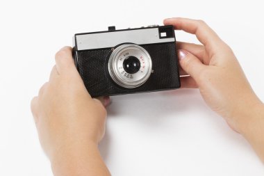 Beyaz arkaplandaki kamera