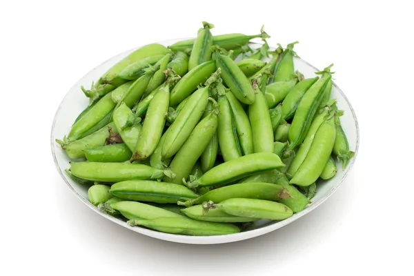 Peas on the white background — Stock Photo, Image