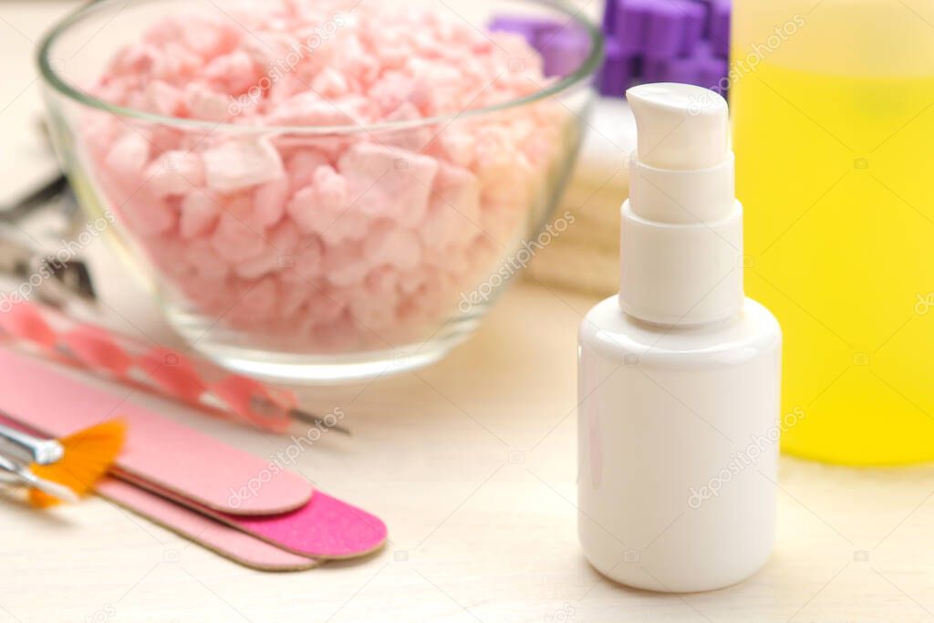 Nail polish remover, various manicure and pedicure tools.