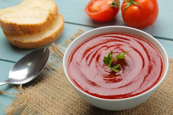 Tomato Soup Herbs Bread White Bowl Spoon Blue Wooden Table — Stock Photo, Image