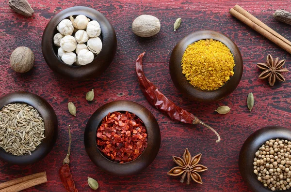 Set of various Indian spices on rusted wooden background — Stock Photo, Image