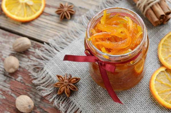 Homemade candied peels orange jam in glass jar — Stock Photo, Image