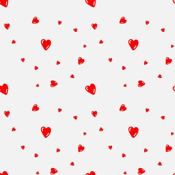 Pattern of red hearts in Doodle style — стоковый вектор