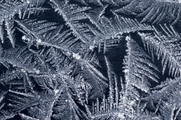 Frost on winter window, black background — Stock Photo, Image