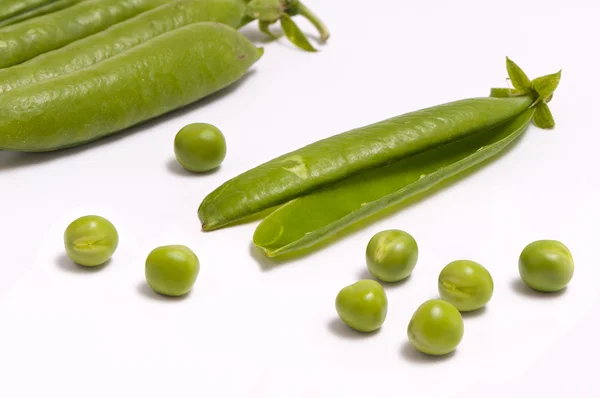 Groene erwten en peulen — Stockfoto