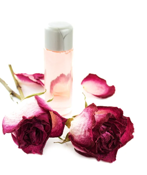 Aceite esencial con rosa seca — Foto de Stock