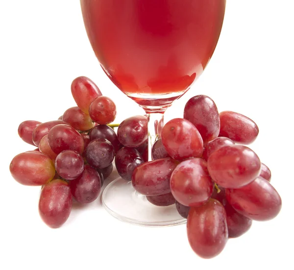 Стакан красного виноградного сока — стоковое фото