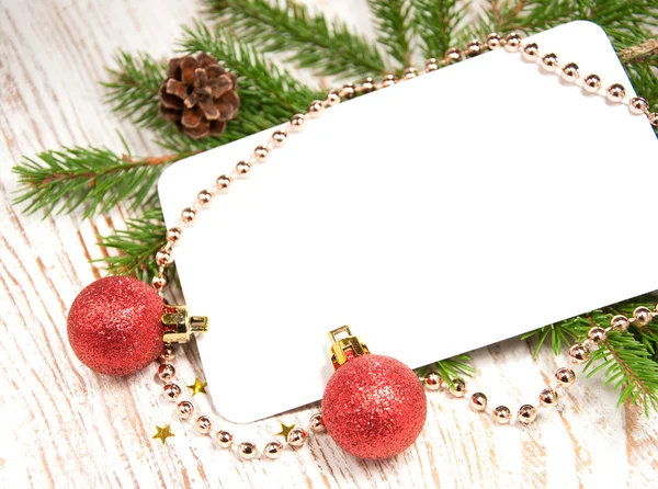 Biglietto natalizio con decorazioni — Foto Stock