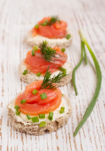 Canapes with salmon — Stock Photo, Image