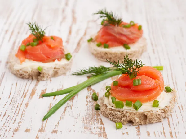 Canapes with salmon — Stock Photo, Image