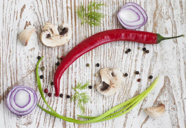 Chilis, red onion,  mushrooms and garlic — Stock Photo, Image