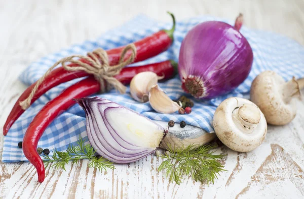 Chilis, red onion,  mushrooms and garlic — Stock Photo, Image