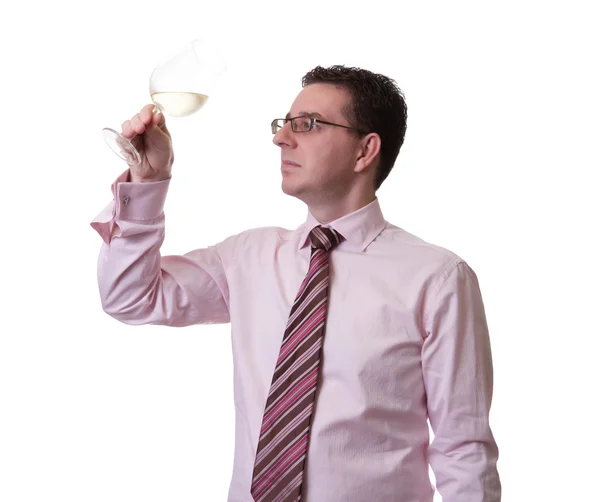 Man sippa på ett glas vitt vin — Stockfoto