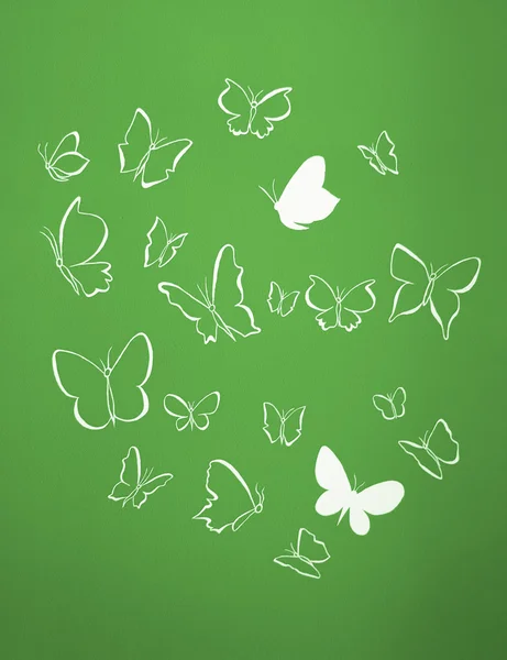 Hintergrund der weißen Silhouetten Schmetterlinge fliegen — Stockfoto