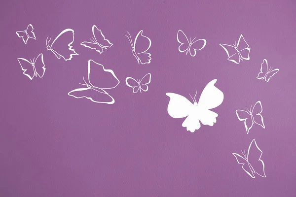 Pozadí bílé siluety motýli letící — Stock fotografie