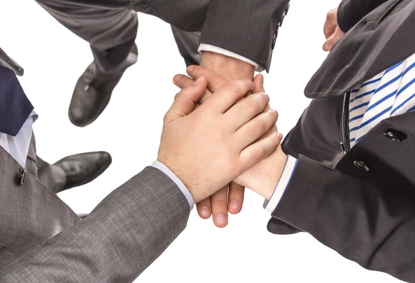 Business partners with hands above showing power and unity — Stock Photo, Image