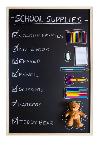 School supplies over blackboard background — Stock Photo, Image