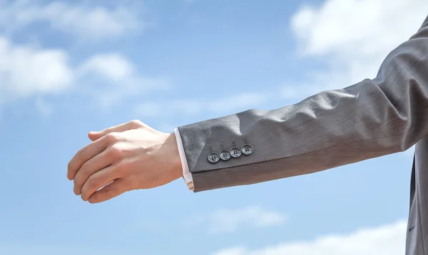 Closeup of business man showing his open hand — Stock Photo, Image