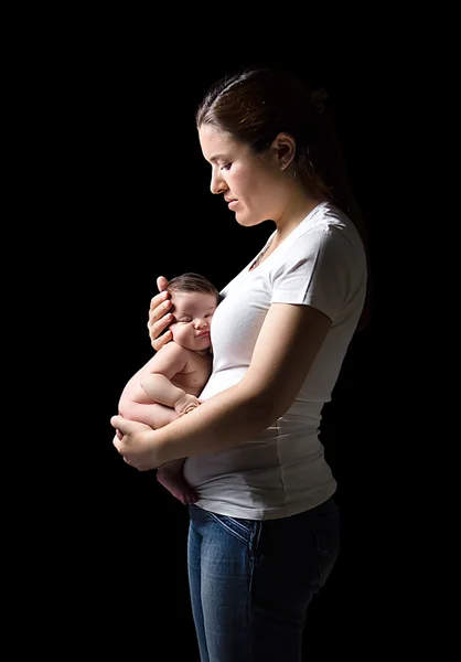 Mother holding a newborn in her belly — Stock Photo, Image
