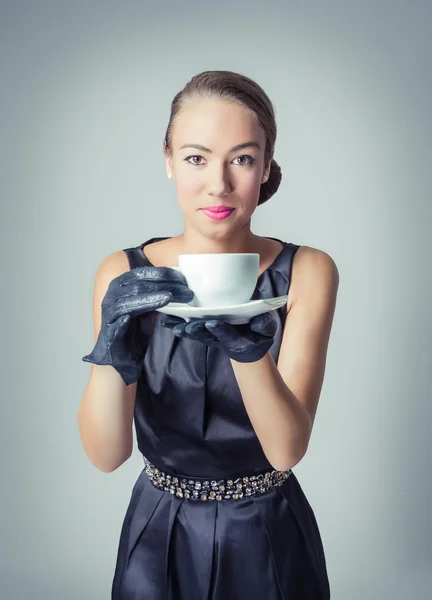 Vintage beautiful fashion girl with coffee cup — Stock Photo, Image