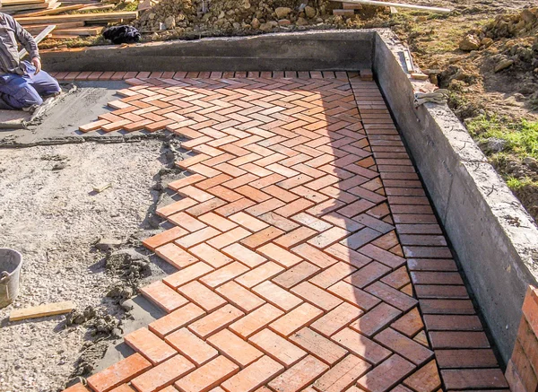 Orange brick paving stones in construction process — Stock Image Orange brick paving stones in construction process Stock Picture
