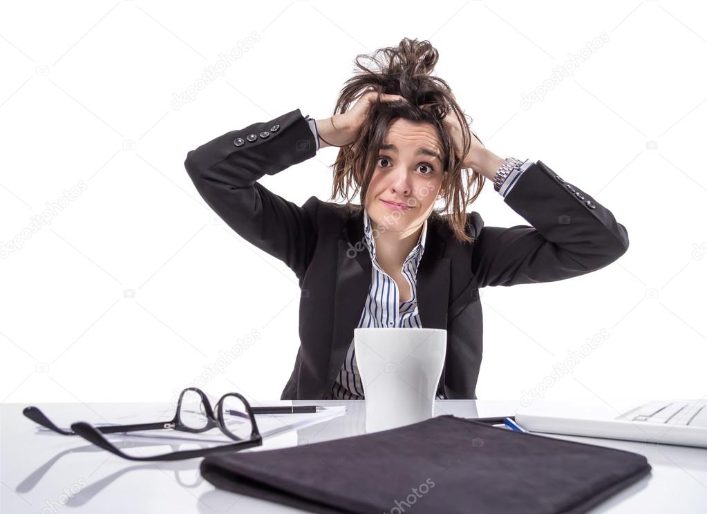 Stressed business woman pulling her hair