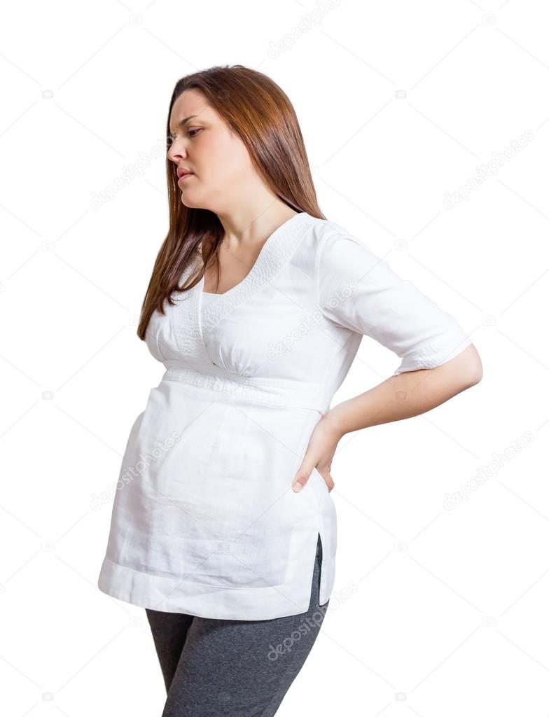 Pregnant woman with strong pain massaging her back