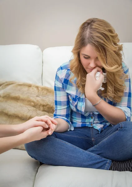 Hands of mother consoling sad teen daughter crying — Stock Photo, Image