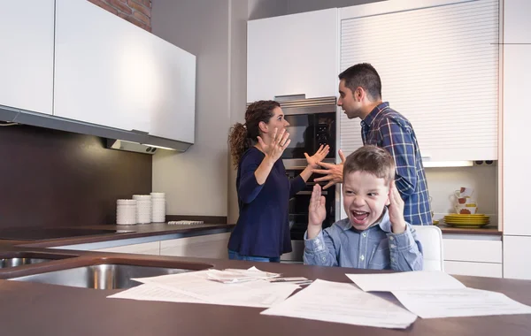 Furious child screaming and parents in a quarrel — Stock Photo, Image