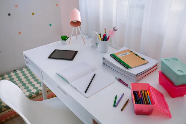 Desk in girls bedroom decorated in pastel colors — Stock Photo, Image